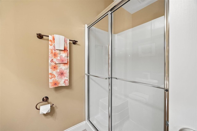 bathroom featuring an enclosed shower