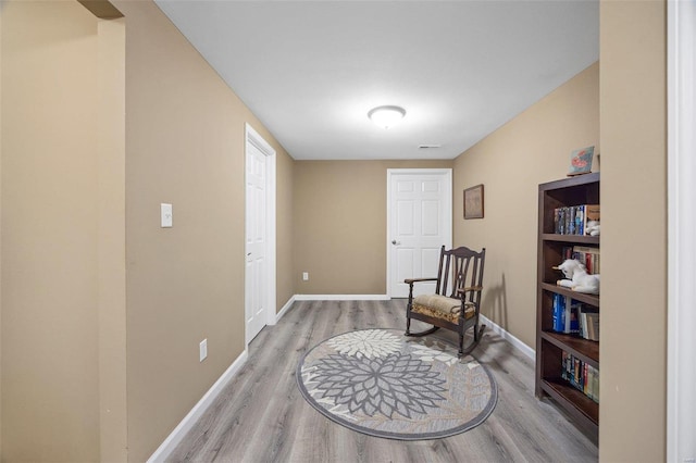 living area featuring hardwood / wood-style flooring