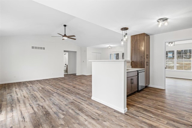 kitchen featuring open floor plan, wood finished floors, visible vents, and dishwasher