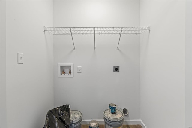 laundry area featuring laundry area, baseboards, wood finished floors, washer hookup, and electric dryer hookup