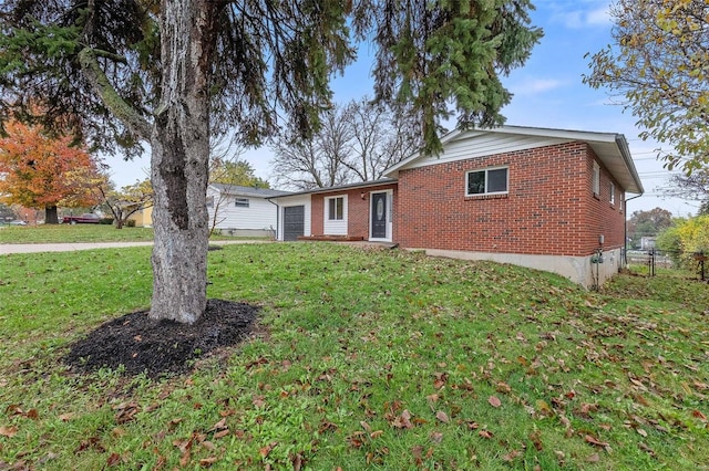 ranch-style house with a front lawn