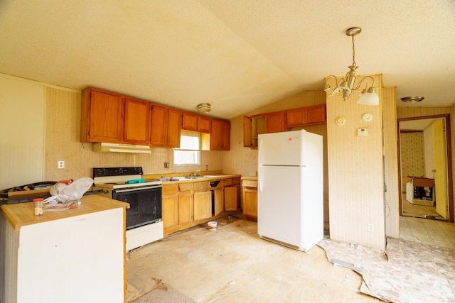 kitchen with white appliances, lofted ceiling, sink, decorative light fixtures, and a notable chandelier