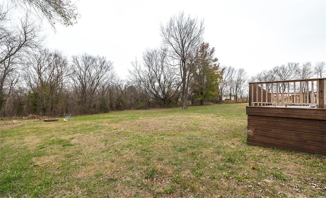 view of yard with a deck