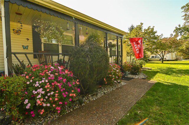 view of home's exterior featuring a yard