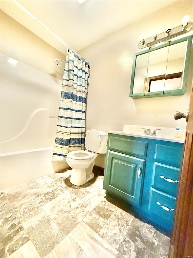 full bathroom with shower / bath combo, toilet, and vanity