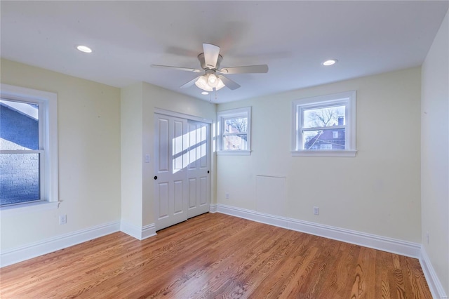 entrance foyer featuring light wood-type flooring and ceiling fan