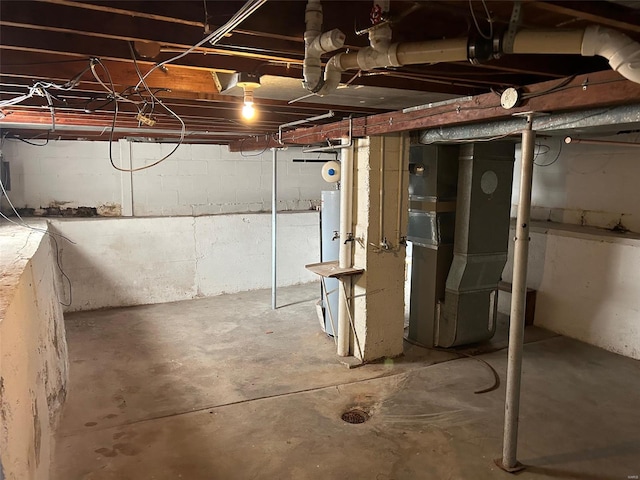 basement featuring heating unit