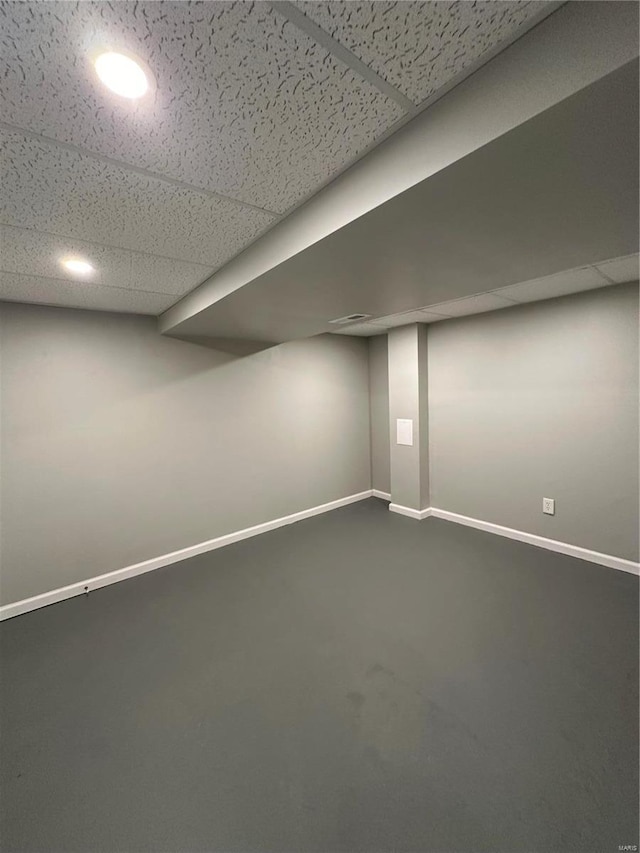 basement with a drop ceiling