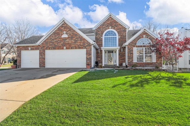 view of property with a front yard and a garage