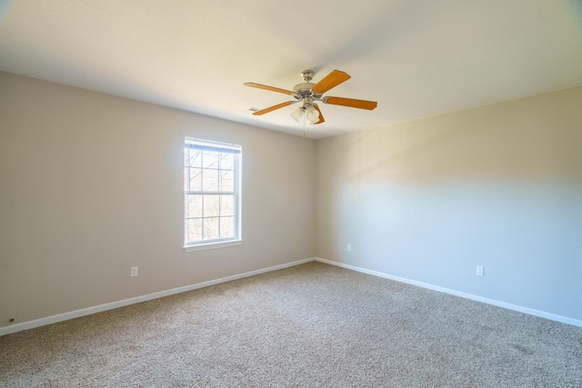 spare room featuring carpet