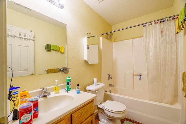 full bathroom with toilet, vanity, a textured ceiling, and shower / tub combo with curtain