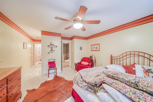 bedroom with crown molding and ceiling fan