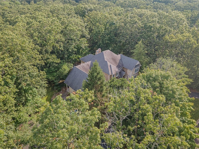 aerial view featuring a view of trees