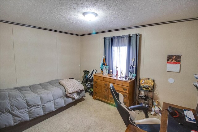 carpeted bedroom with a textured ceiling