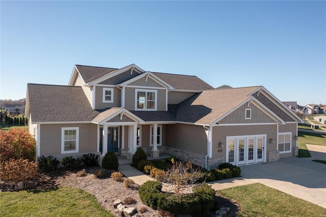 craftsman-style house with french doors