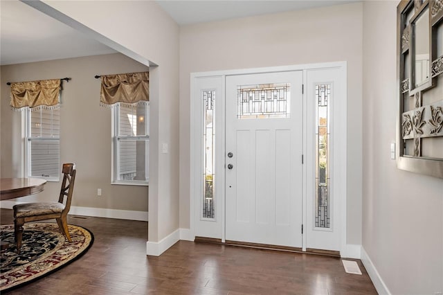 foyer featuring dark hardwood / wood-style floors