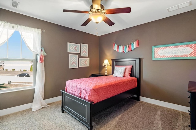 carpeted bedroom with ceiling fan