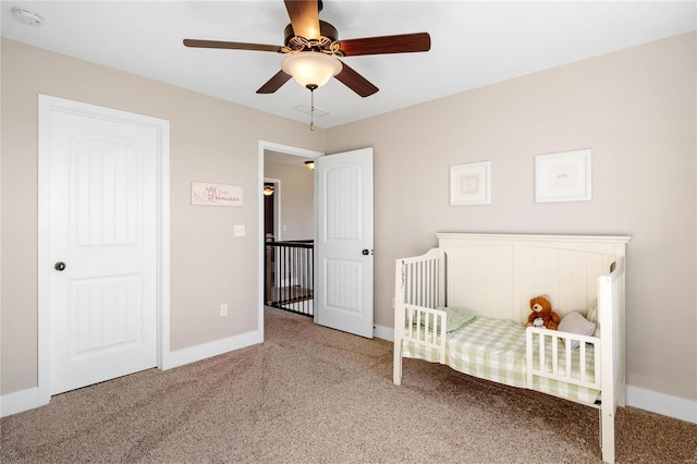 unfurnished bedroom with carpet flooring and ceiling fan