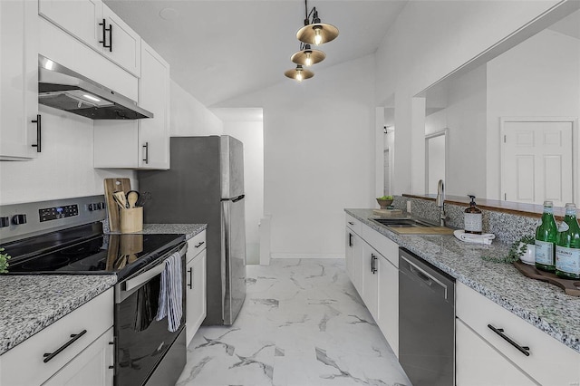 kitchen featuring sink, white cabinets, lofted ceiling, and appliances with stainless steel finishes