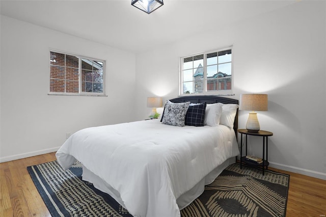 bedroom featuring hardwood / wood-style flooring