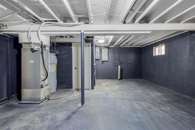 basement featuring electric water heater, heating unit, and electric panel