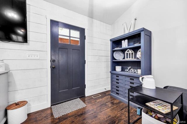 entryway with dark wood-type flooring