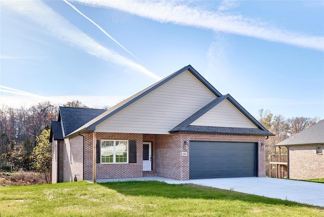 view of front of property featuring a front yard and a garage