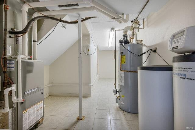 utility room with heating unit