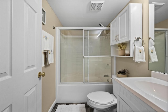 full bathroom featuring vanity, toilet, and enclosed tub / shower combo