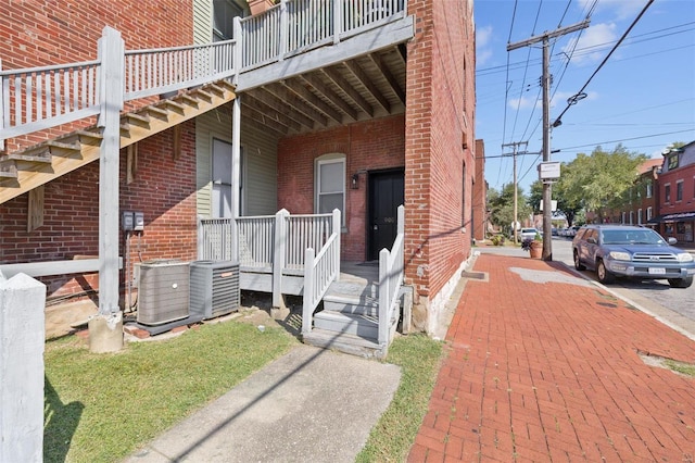 doorway to property with central AC