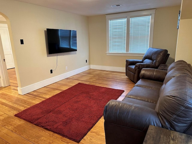 living room with hardwood / wood-style floors