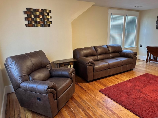 living room with hardwood / wood-style floors