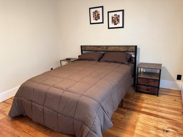 bedroom featuring light wood-type flooring