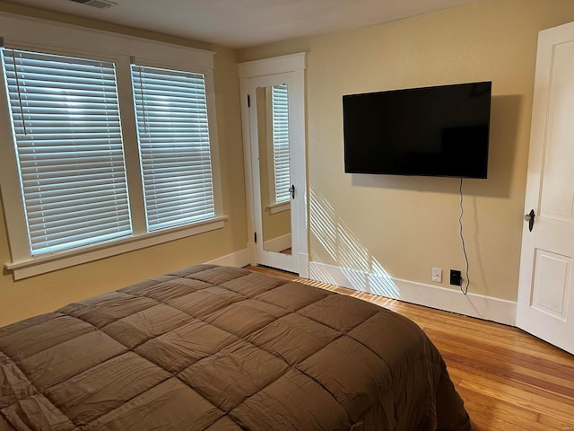 bedroom featuring light hardwood / wood-style floors