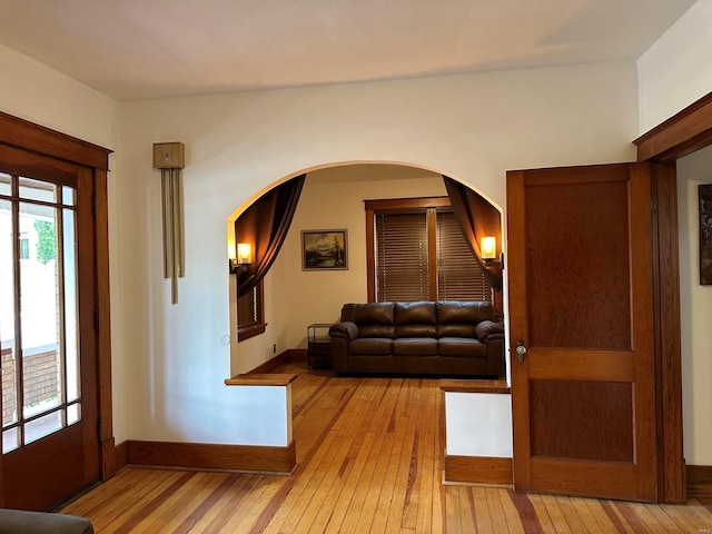 interior space featuring plenty of natural light and light hardwood / wood-style flooring