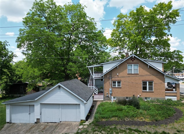 view of front of house featuring an outbuilding and a garage