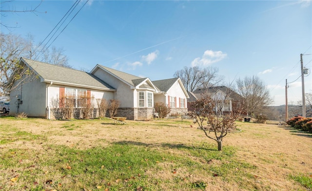 exterior space featuring a yard