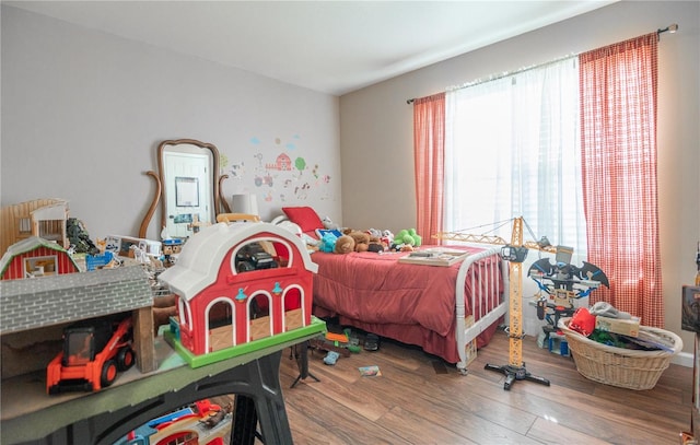 bedroom featuring hardwood / wood-style flooring