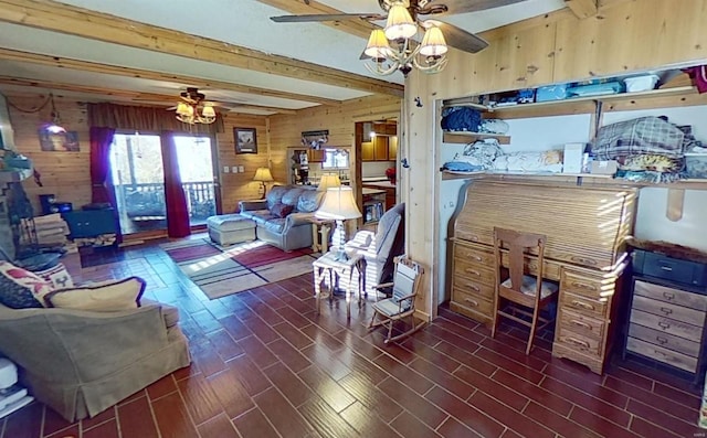 living room with beamed ceiling, dark hardwood / wood-style floors, ceiling fan, and wooden walls