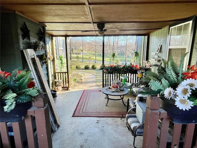 sunroom / solarium with ceiling fan