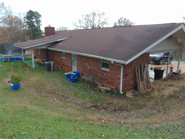 view of home's exterior featuring a trampoline