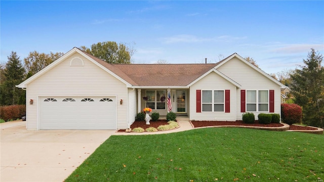 ranch-style house with a garage and a front lawn