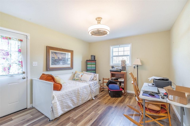 bedroom with light hardwood / wood-style flooring