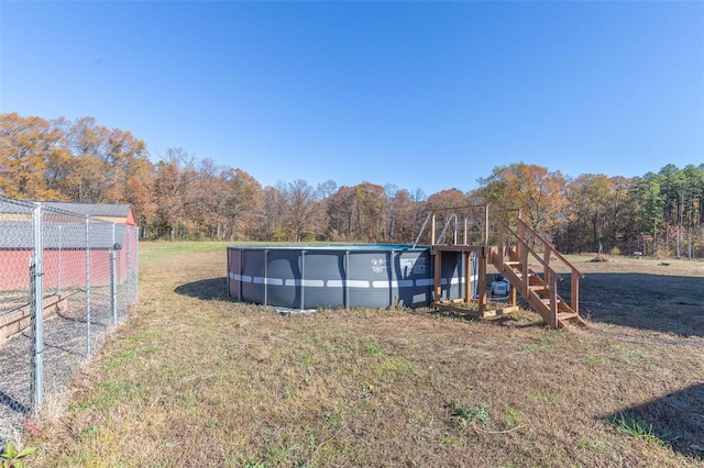 rear view of property with a yard