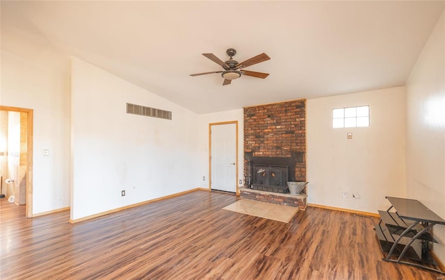 unfurnished living room with a fireplace, ceiling fan, hardwood / wood-style floors, and lofted ceiling