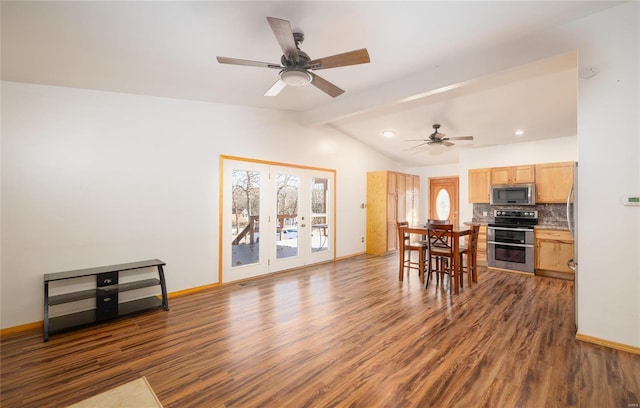 dining area with french doors, vaulted ceiling with beams, dark hardwood / wood-style floors, and ceiling fan