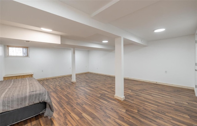 unfurnished bedroom with dark hardwood / wood-style floors