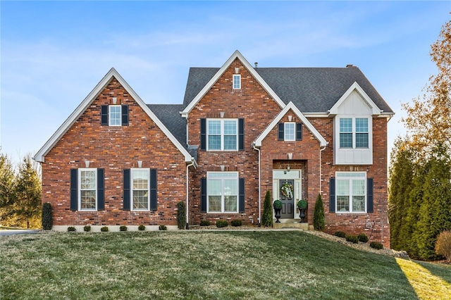 view of front of property with a front lawn