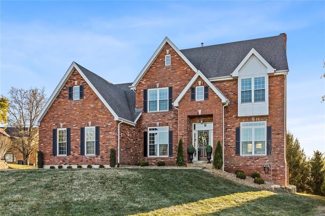 view of front of home with a front yard