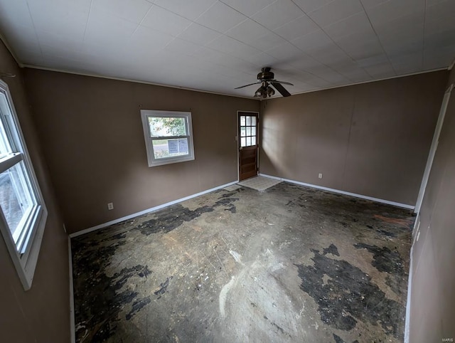 unfurnished room with ceiling fan